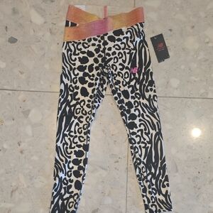 New Balance Black and White Animal Print Leggings with Gold and Pink Waistband